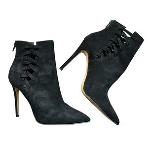 Aldo size 6 black suede stiletto booties with criss-cross cut out detailing.